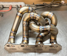 Load image into Gallery viewer, CCdesign 1G/2G DSM Divided T4 Bottom Mount Turbo Manifold
