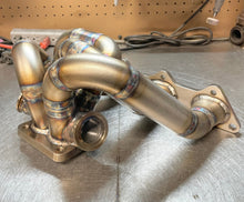 Load image into Gallery viewer, CCdesign 1G/2G DSM Divided T4 Bottom Mount Turbo Manifold