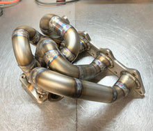 Load image into Gallery viewer, CCdesign 1G/2G DSM Divided T4 Bottom Mount Turbo Manifold