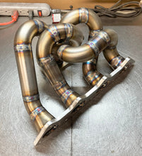 Load image into Gallery viewer, CCdesign 1G/2G DSM Divided T4 Bottom Mount Turbo Manifold