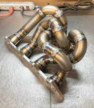 Load image into Gallery viewer, CCdesign 1G/2G DSM Divided T4 Bottom Mount Turbo Manifold